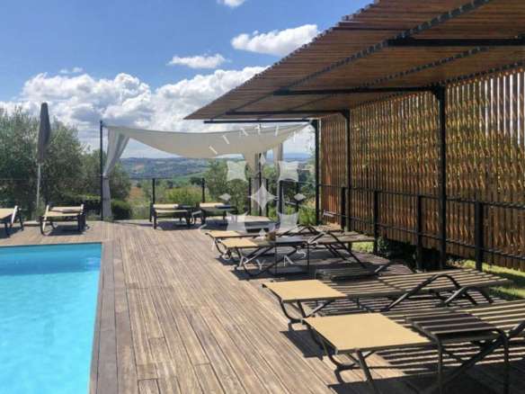 A Restored Boutique Hotel with Pool in the Hills of Le Marche