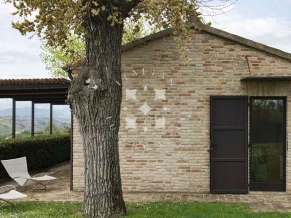 A Restored Boutique Hotel with Pool in the Hills of Le Marche