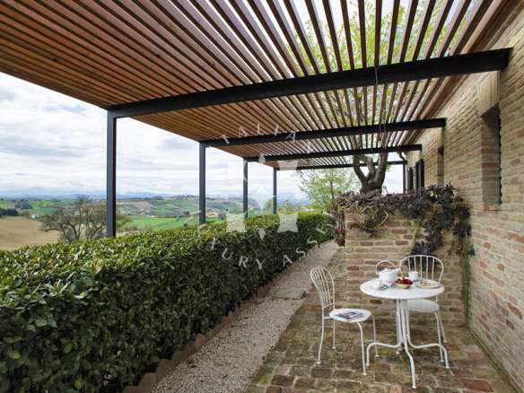 A Restored Boutique Hotel with Pool in the Hills of Le Marche
