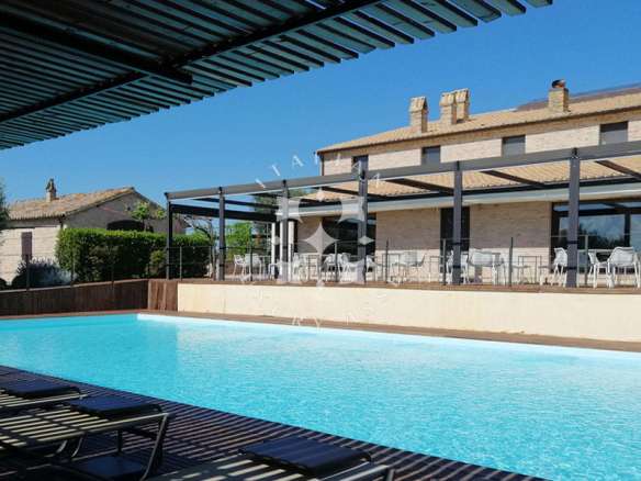 A Restored Boutique Hotel with Pool in the Hills of Le Marche