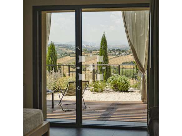 A Restored Boutique Hotel with Pool in the Hills of Le Marche