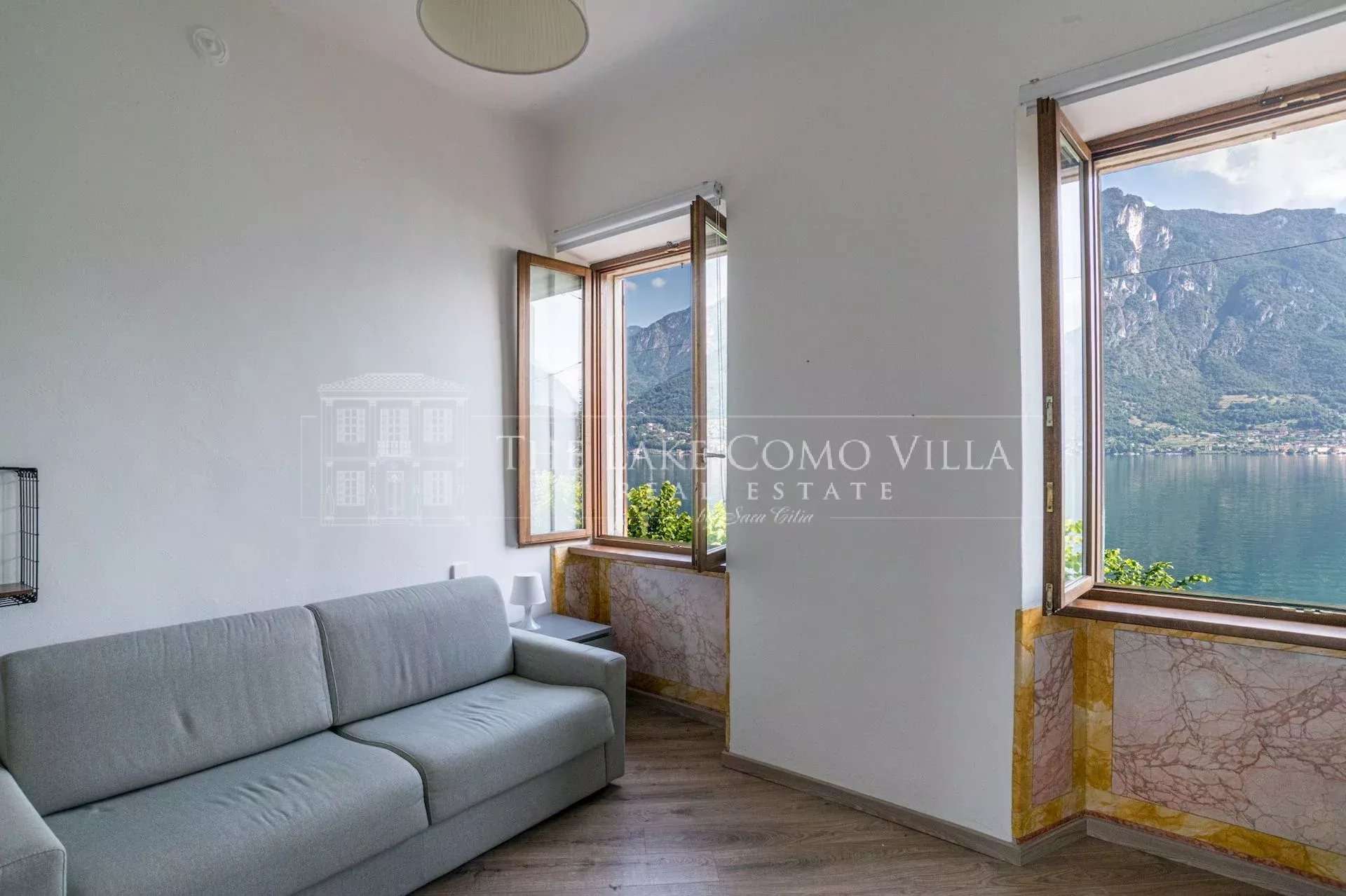 4dfab8b55d8ce45fb30f5d052ed432c4_486312d927_1920-original Osteno Lakeshore Apartment With Panoramic Lake Views & Terrace